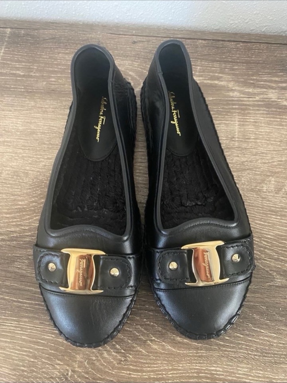 Salvatore Ferragamo Black Leather Flats with Gold Vara Accent